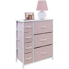 a pink dresser with drawers and a white lamp on it's side table, against a white background