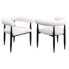 pair of mid century modern black and white chairs