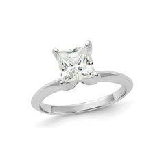 a princess cut diamond ring on a white background