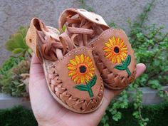 Beautiful Sunflower lace up baby and toddlers huarache sandalWe also have the lace up sunflower for adult you can create a mommy and baby matching outfit!!If you want to make sure they'll fit, please measure your baby foot from toe to heel.Use the following chart to choose the correct size.Size 5 walker  measure 12 cmSize 6 walker measure 13cmSize 7 walker measure 14cmSize 8 toddler measure 15cmSize 9  toddler measure 16cmSize 10 toddler measure 17cmSize 11  toddler measure 18cmSize 12  toddler Adjustable Huarache Sandals For Spring Festival, Handmade Casual Huarache Sandals For Spring, Spring Festival Adjustable Huarache Sandals, Handmade Adjustable Huarache Sandals For Spring, Casual Handmade Huarache Sandals For Spring, Adjustable Casual Huaraches For Spring, Casual Adjustable Huaraches For Spring, Handmade Casual Huaraches For Spring, Casual Handmade Huaraches For Spring