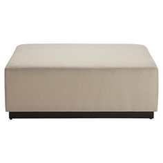 the footstool is upholstered and ready to be used as an ottoman