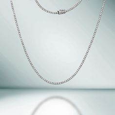 The Diamond Tennis Necklace is a stunning piece of jewelry that features a total of 8.05 carats of high-quality diamonds set in 14K gold. Each diamond is secured by a 4-prong setting, ensuring that they are held securely in place and allowing them to shine brilliantly. The diamonds are carefully selected for their exceptional quality, all our diamond are 100% natural. The necklace is designed with a delicate chain that sits elegantly around your neck, making it the perfect accessory for any occasion. Whether you're looking to add some sparkle to your everyday wear or to make a statement at a special event, this Diamond Tennis Necklace is sure to impress. It's a timeless piece that will be cherished for years to come. PRODUCT DETAILS: Metal Type: 14K Gold Gold Weight: 15.50 gr. Diamond Weig Beautiful Diamond Necklace, Diamond Tennis Necklace, 14k Yellow Gold Necklace, White Gold Necklaces, Tennis Necklace, Natural Earth, Quality Diamonds, Diamond Sizes, Box Chain