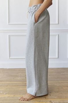 Wardrobe-staple sweatpants by Out From Under that you'll reach for again and again. Cut from fabric with an ultra-soft feel in a slouchy fit we love with a mid-rise and a baggy wide-leg. Finished with side-split hems. Find it exclusively at UO. Features Out From Under sweatpants made to be lived in Relaxed slouchy fit Pull-on with easy side pockets UO exclusive Content + Care 58% Cotton, 42% polyester Machine wash Imported Size + Fit Model in Grey is 5’7" and wearing size Small Measurements take Relaxed Fit Sweatpants For Loungewear, Cotton Sweats With Straight Hem For Lounging, Comfortable Sweats With Pockets And Straight Hem, Casual Everyday Sweats With Straight Hem, Casual Straight Leg Sweats With Comfort Waistband, Relaxed Fit Sweats For Lounging With Straight Hem, Loungewear Sweatpants With Comfort Waistband, Fall Sweatpants With Side Pockets And Straight Hem, Straight Hem Sweats With Elastic Waistband For Loungewear