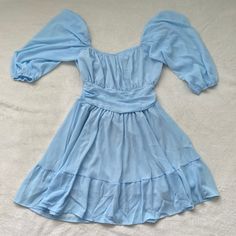 Woman’s Blue Dress With Quarter Sleeves And Bow In The Back! Size Small B20 Light Blue Flowy Mini Dress For Date Night, Flowy Light Blue Mini Dress For Date Night, Quarter Sleeve, Blue Dress, The Back, Blue Dresses, Colorful Dresses, Color Blue, Mini Dress