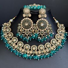 RamaGreen Antique Polki Kundan Monalisa stone Necklace, bridal, Indian Wedding Jewelry Antique Reverse Ad Stone Necklace With Mehndi Plating Regular Size And Adjustable Shadow Stone Necklace Earrings length 3.25 inches, Width 1.75 inches Tikka Length Approx 6 inches, Width 1.75 inches This is 100% Handmade jewelry. So the color, shades, and texture displayed may vary slightly from the actual product due to digital image limitations. We request you to consider these minor variations. Please expect the possibility of some slight imperfections when buying handmade jewelry. If you have any questions, please message or email us. Arrives in a gift box. Please let me know if you have any questions. Thank you so much for visiting my shop. Bollywood Style Jeweled Bridal Necklace For Reception, Green Bollywood Bridal Sets For Reception, Green Bridal Sets For Diwali Reception, Diwali Reception Green Bridal Sets, Jeweled Chandbali Bridal Necklace, Chandbali Jeweled Bridal Necklace For Wedding, Wedding Jeweled Chandbali Bridal Necklace, Stone Work Jewelry Sets For Weddings, Bollywood Style Jeweled Bridal Necklace