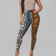 Multi Colored Snake Print Leggings In Size Medium Casual Multicolor Printed Leggings, Fall Multicolor Fitted Leggings, Multicolor Stretch Bottoms For Fall, Fitted Multicolor Leggings For Fall, Multicolor Printed Stretch Leggings, Stretch Multicolor Printed Leggings, High Waist Blue Leggings For Fall, Casual Multicolor Print Stretch Bottoms, Casual Stretch Bottoms In Multicolor Print