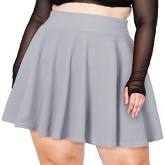 Look your best this season with this stylish high waisted skater skirt! This plus size skirt features a classic grey hue with a flattering fit. Fitted Skort With Flared Skirt In Solid Color, Gray Stretch Skirted Bottoms, Fitted Gray Skirt For Summer, Gray Fitted Skirt For Summer, Gray Stretch Skirt For Summer, Gray Mini Skirt For Summer, Gray Short Summer Skirt, Casual Stretch Gray Skort, Fitted Gray Mini Skirt For Summer