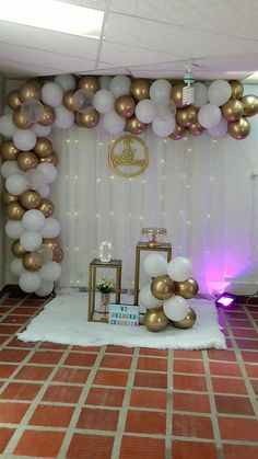 a room with balloons and decorations on the wall