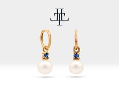 This pearl stud earrings are a beautiful jewelry, it made from 14K solid gold, with the addition of round cut sapphire. This combination of pearls, gold, and sapphire can create a classic and elegant look, perfect for bridal jewelry. 2,85 MM Sapphire Earring  Pearl                       :     2 pieces (18,00 mm) Sapphire                :     App. 0,25 ct  Gram                      :     App.  1,73 GR Product Code       :     LE00083PS 3,95 MM Sapphire Earring  Pearl                        : Elegant Gemstone Huggie Earrings For Formal Events, Elegant Gemstone Huggie Earrings For Formal Occasions, Elegant Formal Huggie Earrings With Gemstone, Elegant Gold Huggie Earrings With Birthstone, Elegant Sterling Silver Huggie Earrings With Birthstone, Elegant Sapphire Hoop Earrings As Gift, Elegant Round Huggie Earrings With Birthstone, Sapphire Earring, Earring Pearl