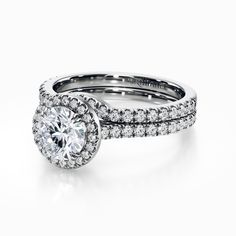 a diamond ring with two rows of diamonds around it