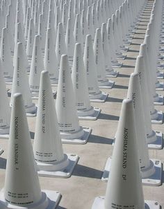 rows of white cones sitting on top of each other