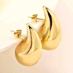 Handcrafted earrings, gold plated teardrop shape earrings. So feminine and versatile. We adore these pretty shaped earrings, wear them with Jeans and a t-shirt or dressed up. Gold plated chunky earrings Made with love in Los Angeles Complimentary gift wrapping provided All sales final. Gold Teardrop Pendant Earrings For Gift, Modern Gold Teardrop Crown Earrings, Trendy Gold Teardrop Hoop Earrings, Trendy Teardrop Yellow Gold Hoop Earrings, Minimalist Gold Teardrop Pendant Earrings, Trendy Yellow Gold Teardrop Hoop Earrings, Minimalist Gold Teardrop Earrings, Modern Gold Teardrop Earrings, Modern Gold Teardrop Drop Earrings