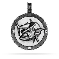 All medallions are custom designed originals with the highest quality .925 sterling, .935 Argentium non-tarnish silver, 10k, 14k, or 18k gold and can be set with a genuine precious stone (your choice of Ruby, Sapphire, or Emerald). SPECIFICATIONS Mackerel "Kingfish" Compass Medallion Pendant Material : Sterling Silver/Yellow Gold/ White Gold Material Purity : .925 / 10K / 14K / 18K Material Color : Yellow/White Manufacturing Process: Investment Casting Finish : High Polish Gemstone: Faceted Gend Luxury Silver Medallion Jewelry, Luxury Compass Medallion Jewelry, Luxury Compass Design Medallion Jewelry, Sterling Silver Coin Jewelry With Polished Finish, Luxury Silver Jewelry With Coin Pendant, Collectible White Gold Medallion Jewelry, Custom Sterling Silver Jewelry With Polished Finish, Luxury Sterling Silver Compass Design Jewelry, White Gold Medallion With Oxidized Finish