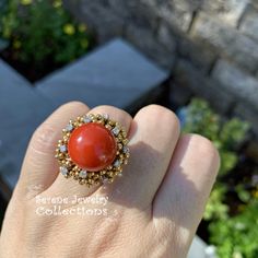 Thank you for coming in! Beautiful Flower Red Coral diamond Ring! The coral is in a sphere shape and is surrounded by small gold balls and scattered white round diamonds. Ring Size: 5 Total Weight: 15.47 grams Precious Metal: 18k solid gold Precious stones: -Coral Center Stone: 14.2mm x 14.2mm,24 carats -White Round diamonds: 0.25 ct Hallmark: 18k Red Coral Ring, Gold Ring Vintage, Platinum Diamond Rings, Black Beaded Jewelry, Flower Red, Coral Ring, Brooch Bouquets, Solid Gold Ring, Solid Gold Rings