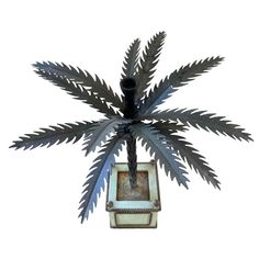 a metal plant hanging from the side of a light fixture on a white background with clippings