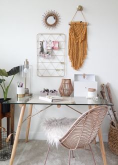 a glass table topped with a wooden chair