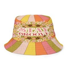 Kate McEnroe New York 70s Groovy Hippie Sunkissed Reversible Bucket HatHats63C775721B24A_16360 Retro Multicolor Bucket Hat For Summer, Adjustable Retro Summer Hat, Retro Multicolor Sun Hat For Summer, Retro Adjustable Bucket Hat For Summer, Retro Multicolor Summer Sun Hat, Retro Multicolor Summer Hats, Adjustable Retro Bucket Hat For Summer, Retro Wide Brim Sun Hat For Summer, Retro Summer Vacation Sun Hat