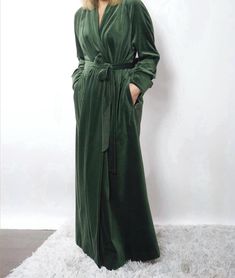 All my robes - https://www.etsy.com/shop/HBStyleEU Long velvet robe with 2 pockets, long sleeves, belt loops and belt. The fabric is wonderfully velvety and silky, soft and pleasant to the touch. - 100% Organic Cotton. - The model is wearing a dark green colored robe. SIZING SIZE S Bust: fits bust around 32"-36"/ 82-92 cm Hips: fits hips around 35"-39"/ 89-99 cm SIZE M Bust: fits bust around 35"-39"/ 89-99 cm Hips: fits hips around 38"-42"/ 97-107 cm SIZE L Bust: fits bust around 38"-42"/ 97-107 cm Hips: fits hips around 41"-45"/ 104-114 cm SIZE XL Bust: fits bust around 41''-45''/ 104-114 cm Hips: fits hips around 44''-48'' / 112-122 cm The width of the robe folded in half with a 6" (15cm) scent: XS - bust 39" (99cm), waist 38,5" (98cm), hips 42,5" (108cm) S - bust 40,5" (103cm), waist 40 Luxury Green Robe For Women, Green Dressing, Cotton Dressing Gown, Sheer Robe, Dressing Gown Robe, Dress Cotton, Womens Robes, House Dress, Dressing Gown