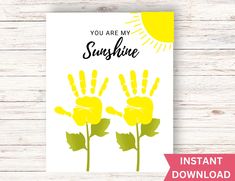 you are my sunshine hand printable card with yellow flowers on white wood planks