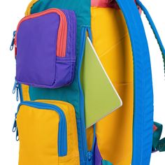 Explore the giant storage found inside our best selling Mega Backpack! This color blocked travel backpack boasts ultimate carrying power with 5 outside zip pockets, a truly MEGA main compartment, and hidden back-side pocket. Get ready to pack to your heart's desire! Structured foam lining doubles as insulation so you can use your bag as a cooler. Giant front zip compartment with flat zip pocket for items that require easy access. Travel made simple with a suitcase handle sleeve to slide onto you Nylon Backpack With Water Bottle Pocket For Trip, Sporty Standard Backpack For Adventure, Multicolor Nylon Hiking Bag, Multifunctional Backpack With Zipper Pocket For Trips, Functional Backpack With Zipper Pocket For Trips, Functional Multicolor Backpack For Outdoor, Functional Multicolor Backpack With Zipper Pocket, Sporty Multicolor Travel Backpack, Travel Backpack With Color Block