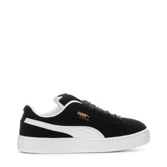 A fresh take on the classic Suede—this PUMA Suede XL youth sneaker is one for the books. Featuring an exaggerated padded collar tongue, a chunkier sole, and thick laces, this execution is inspired by the 00s but made for the modern day. A full suede upper plus a leather Formstrip makes this classic, durable, and ready for everyday looks.Features: Full suede upper with leather Formstrip. Exaggerated padded collar and tongue. Mesh insole with multiple screen-printed PUMA logo. Thick laces for a th Lace-up Jogging Sneakers With Gum Sole, Lace-up Sneakers With Gum Sole For Jogging, Classic High-top Skate Shoes With Laces, Classic High-top Lace-up Sneakers For Streetwear, Classic Lace-up High-top Sneakers For Streetwear, Classic High-top Sneakers With Contrast Sole For Streetwear, Classic Mid-top Skate Shoes With Laces, Sporty Skate Shoes With Rubber Waffle Outsoles For Streetwear, Modern Lace-up Sneakers For Streetwear