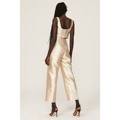 Ivory satin (100% Polyester). Lining (100% Recycled Polyester). Pants. Front zipper closure. 26" inseam. 12" rise. imported. Elegant Gold Silk Bottoms, Silk Evening Pants For Spring, Spring Evening Silk Pants, Gold Silk Bottoms For Party, Beige Pants For Spring Evening, Fitted Silk Cream Bottoms, Fitted Satin Bottoms, Spring Satin Straight Leg Pants, Fitted Cropped Evening Pants