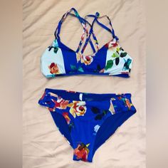 Athleta 2 Piece Swim, Brand New Without Tags Never Worn, Just Never Returned. Top Is A Medium With Super Cute Crossing Straps,Removable Padding, Bottoms, Smalll Blue Sporty Swimwear For Spring, Sporty Blue Swimwear For Spring, Womens Swim, 2 Piece, Color Blue, Super Cute, Swimming, Brand New, Tags