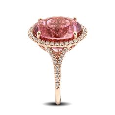 Large, and unbelievably clear, this 13.68 carats Pink Tourmaline that was mined in Brazil is a rare find. The gems pink hues match perfectly with the 14K rose gold bringing out the best the gem has to offer. Set with a halo of diamonds that highlight the ring, you will feel the ring’s design almost wrap around your finger like a glove.
LCK20234-PT
#373754 Luxury Pink Cabochon Ring, Pink Morganite Rings Gia Certified, Pink 14k Rose Gold Jewelry With Halo Setting, Pink Morganite Gia Certified Rings, Gia Certified Pink Morganite Rings, Formal Pink Morganite Rings, Luxury Pink Morganite Jewelry, Luxury Pink Tourmaline Rings, Pink Gemstone Rings In 14k Rose Gold