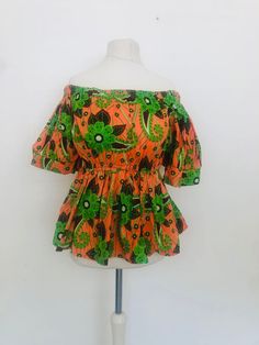 African Print peplum blouse with bell sleeves Choose from 3 different print Orange Short Sleeve Blouse With Ruffles, Orange Ruffled Short Sleeve Blouse, Patterned Fitted Tops With Ruffles, Fitted Patterned Tops With Ruffles, Fitted Patterned Top With Ruffles, Patterned Short Sleeve Blouse With Ruffles, Fitted Floral Print Blouse With Bell Sleeves, Fitted Peplum Blouse With Ruffle Hem, Multicolor Bell Sleeve Casual Tops