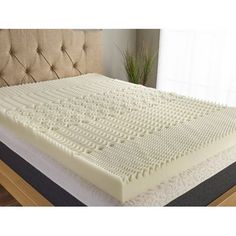 the mattress is made up and ready for someone to use it on their bedding