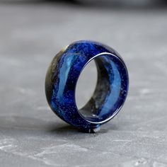 Unique wooden ring crafted by hand from stabilized maple wood & Resin Jewelry. Incredible landscape of nature in a miniature world inside the ring. You can also purchase a thinner ring. To do this, follow the link https://www.etsy.com/listing/701537823/wood-bands-ring-wooden-rings-for-women?ref=shop_home_active_1&frs=1 The wooden ring you will receive will be a little different from the picture, because each ring is totally handmade. But we saving the style, material and color. Your orde Wooden Rings Craft, Raw Amethyst Ring, 5 Year Anniversary Gift, Rings Blue, Wood Resin Jewelry, Resin Rings, Miniature World, 5 Year Anniversary, How To Make Rings