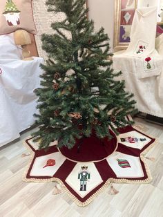 a small christmas tree sitting on top of a table