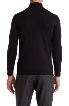 A supersoft turtleneck sweater knit from stretch-enhanced cotton offers a performance fit that's breathable, comfortable and stylish. Turtleneck Long sleeves 97% cotton, 3% spandex Hand wash, dry flat Imported Model stats: 6'1" height, 32" waist. Stretch Black Turtleneck, Fitted Cotton Turtleneck With Long Sleeves, Fitted Cotton Long Sleeve Turtleneck, Solid Cotton Turtleneck For Layering, Cotton Turtleneck For Layering, Long Sleeve Cotton Turtleneck, Winter Cotton Stretch Turtleneck, Winter Stretch Cotton Turtleneck, Stretch Cotton Long Sleeve Turtleneck