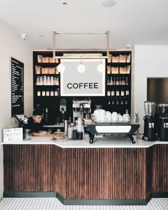 a coffee shop with black and white tile flooring