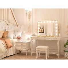 a bedroom with a vanity, mirror and stool