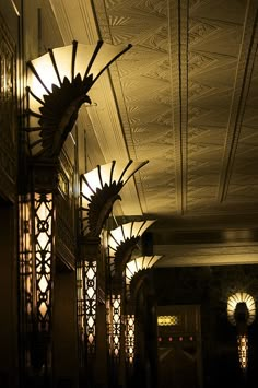 the hallway is dimly lit and has decorative lighting