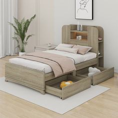 a bed with drawers underneath it in a room