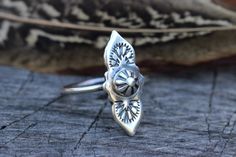 This unique hand stamped sterling silver stacking ring is a unique and interesting ring that features an arabesque shape adorned with geometric stamped designs and a silver bead counterpoint. This little exotic and enchanting ring will become your new favorite ring. It's edgy and elegant at once and is a comfortable all day wear. Wear it alone or stack it with simple silver bands. - Choose your ring size at checkout. - Made to Order: these gorgeous little rings are freshly made just for you. Ple Bohemian Silver Stamped Rings, Bohemian Stamped Silver Rings, Bohemian Sterling Silver Engraved Promise Ring, Stamped Ring, Silver Bands, Rings Sterling Silver, Stamped Rings, Sterling Silver Stacking Rings, Jewelry Hand