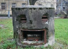 there is a face in the middle of a cement structure that says faces in places you are now interested and start seeing faces in everyday places