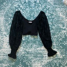 Size S Cropped Long Sleeve From Urban Outfitters. Sleeves Are Lace. Took Off Tags But Never Worn! Black Fitted Crop Top For Spring, Black Stretch Crop Top Blouse, Elegant Black Crop Top With Lace Trim, Elegant Black Lace Trim Crop Top, Chic Cropped Blouse From Urban Outfitters, Black Puff Sleeve Crop Top For Spring, Fitted Fall Blouse From Urban Outfitters, Fitted Blouse From Urban Outfitters For Fall, Fitted Urban Outfitters Blouse For Fall