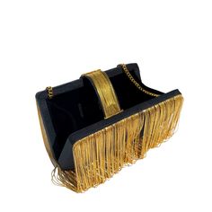 Cocktail hour has officially started and all we can say is ”Cheers!”This new gush-worthy clutch is in an exquisite black silk fabric with a braided flap and gold metal chains that we promise will not tarnish. This stunning statement piece has a lush black velvet interior lining with a magnetic closure on top and a long metal chain handle that allows you to cross sling it too. Due to the delicate nature of hand embroidered embellishments please handle with care Black Silk Fabric, Gold Clutch Bag, Leather Accessories Handmade, Velvet Interior, Slow Fashion Movement, Gold Clutch, Velvet Interiors, Braided Belt, Women Accessories Bags