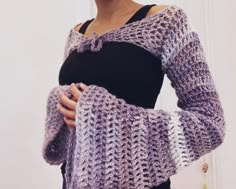 This shrug is a unique accessory to style in winter and spring. One Size Wrap Shrug For Fall, One Size Long Sleeve Winter Shrug, Fitted Wrap Shrug For Fall, Spring Long Sleeve Shrug One Size, Chic Wrap Shrug For Fall, Chic Fall Wrap Shrug, One Size Spring Wrap Shrug, Bohemian Fitted Shrug For Winter, Crochet Shrug Sleeves