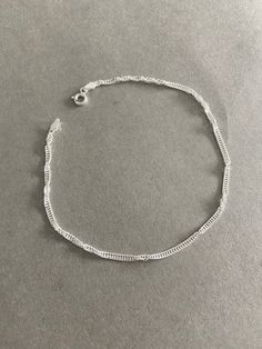 "Silver Singapore Chain Anklet - Sterling Silver ★ Quantity : One Piece ★ Color : Silver ★ Material : Sterling Silver ★ Chain Length : Adjustable with the 9\" to 10\" (25.5 cm) ★ Comes in a jewelry box. If you need extra boxes for gifting....just let us know!" Silver Chain Bracelet With Chain Strap, Adjustable Silver Bracelets With Chain Strap, Jewelry Lookbook, Chain Anklet, Anklet Jewelry, Sterling Silver Chain, Chain Lengths, Sterling Silver Chains, Body Jewelry