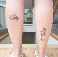 two people with tattoos on their legs, one has a mouse and the other has a cat