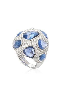 At the center of this statement ring are 15.19 carats of Fancy Shape Round-Cut Blue Sapphires. These sapphires, with their alluring deep blue hues, are meticulously arranged in a captivating pattern, forming the focal point of the ring. Surrounding the stunning blue sapphires are 2.43 carats of brilliant round natural white diamonds. 15.19CT Fancy Rose Cut Blue Sapphires 2.43CT Brilliant Round Natural White Diamonds 18KT White Gold Blue Sapphire Ring, Blue Sapphire Rings, Vibrant Blue, White Diamonds, Blue Hues, Statement Ring, Rose Cut, Deep Blue, Diamond White