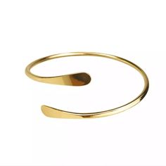 Add some sass to your bangle stack with our Brass Coil Bangle. It features a simple design, with rounded flares on both ends. Bangles sold separately. Modern Adjustable Hoop Bracelets, Modern Adjustable Hoop Cuff Bracelet, Adjustable Bangle Bracelet With Simple Design, Bangle Stack, Stacking Bangles, Marriage Ring, Word Bracelet, Brass Bangle, Brass Cuff