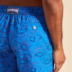 Embroidered men swim shorts, limited production, 99 pieces for the colors Storm blue, Neon blue, Navy blue and Palace blue, 199 pieces for the color red.Swimwear with elastic waistband with drawstring and silver tips (engraving 925 certified)Side pockets and back pocket with Turtle personnalized round snap buttonMen swim shorts with two back eyeletsSide leg length in M: 39.5 cm Enjoy a complimentary first repair of your swim shorts, if registered within 6 monthsFully lined with water-resistant m Blue Swim Trunks With Built-in Shorts, Blue Fitted Swim Trunks For Summer, Blue Short Length Swim Trunks For Pool, Blue Short Swimwear For Pool, Beachwear Blue Short Swim Trunks, Blue Swim Trunks With Built-in Shorts For Pool, Fitted Blue Swim Trunks For Beach Season, Blue Swim Trunks For Pool Beachwear, Blue Beachwear Swim Trunks For Pool