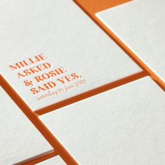 an orange and white wedding stationery with the words mille ased & rose said yes