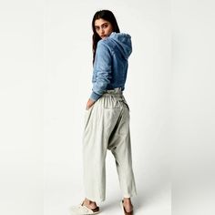 Free People Runyon Striped Blue And White Pants Denim Ankle-length Pants For Fall, Ankle-length Denim Pants For Fall, Light Wash Denim Bottoms For Loungewear, Blue Harem Pants With Relaxed Fit And Straight Leg, Blue Relaxed Fit Straight Leg Harem Pants, Denim Blue Loungewear Bottoms With Elastic Waistband, Denim Blue Relaxed Fit Ankle-length Bottoms, Baggy Washed Blue Pants For Spring, Denim Blue Relaxed Fit Ankle-length Pants