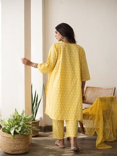 Beautiful handcrafted straight kurta pants set in pure cotton with lovely matching cotton doriya dupatta that is rightly finished with mirror embroidery. Color: Yellow Fabric: Cotton and Kota Doria Note: Length and sizes can be customised Length - Kurta 40 inches Pants 38 inches Available in other colors If you happen to see some deformity in hand-work or fabric, that’s mere the technique of the same and not a defect. The garment is quite premium. The product will be delivered within 20-25 days Kurta Pants, Mirror Embroidery, Straight Kurta, Kurta With Pants, Yellow Print, Yellow Fabric, Hand Work, Kurta Set, Fabric Cotton